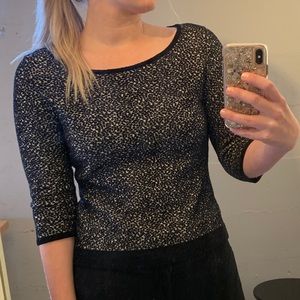 Black and white three quarter back zip sweater